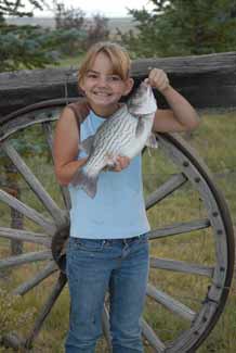 Youth with wiper fish caught at South Fork